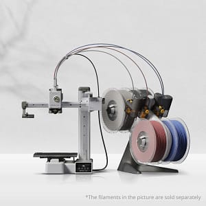 bambu lab a1 mini combo Bambu Lab A1 Mini 3D printer with AMS Lite multi-color system printing a high-detail colorful model on a workshop desk